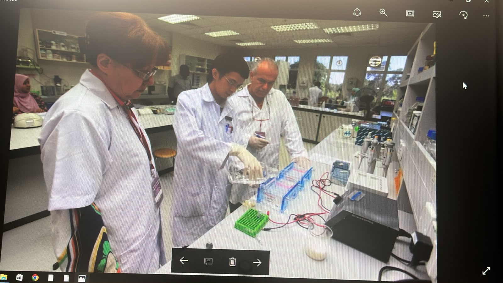 A participant learning laboratory procedures